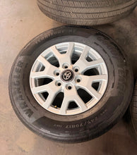 Load image into Gallery viewer, Lightly Used Set of '24-'26 Toyota Tacoma 17" OEM Rims 245/70R17 Goodyear HT LT