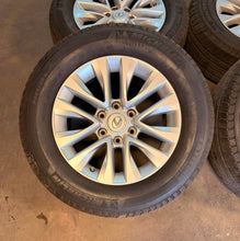 Load image into Gallery viewer, Set of Used 18" Silver '13-'23 Lexus GX460 Wheels on 265/60R18 Michelin Tires LT