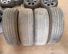 Load image into Gallery viewer, Set of 4 Used 2672 18" Black '19-'26 RAM 1500 Wheels 275/65R18 Goodyear Tires LT