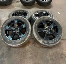 Load image into Gallery viewer, Set of 4 Used '19-'26 RAM 1500 Black OEM Wheels 275/55R20 Bridgestone H/L OWL LT