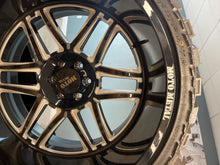 Load image into Gallery viewer, Set of Brand New 24x14 Moto Metal 6x5.5 Black Machined Rims 33/13.50R24 AMP MTs