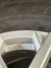 Load image into Gallery viewer, OEM '22-'26 Toyota Tundra 18" Silver Wheels 265/70R18 Bridgestone Dueler H/T LT
