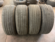 Load image into Gallery viewer, Set of Used 20" '19-'26 RAM 1500 2462 Black Clad Wheels 275/55R20 Bridgestone LT
