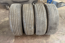 Load image into Gallery viewer, Set of Used 20" '22-'26 Toyota Tundra Dark Charcoal Wheels 265/60R20 Yokohama LT
