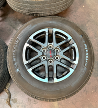 Load image into Gallery viewer, Set of 4 Used 18" '24-'26 Toyota Tacoma TRD Rims on 265/65R18 Michelin Tires LT
