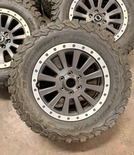 Load image into Gallery viewer, Set of 5 Lightly Used 18" INEOS Grenadier OEM Wheels 255/70R18 BFGoodrich AT LT
