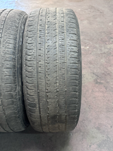 Load image into Gallery viewer, OEM '19-'26 RAM 1500 OEM Black Used Wheels on 275/55R20 Bridgestone HL Tires LT
