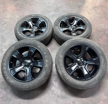 Load image into Gallery viewer, OEM '19-'26 RAM 1500 OEM Black Used Wheels on 275/55R20 Bridgestone HL Tires LT

