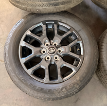 Load image into Gallery viewer, Set of OEM Takeoff '22-'26 Toyota Tundra Dark Charcoal Rims 265/60R20 Tires LT

