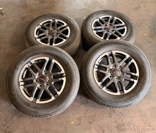 Load image into Gallery viewer, Set of Used TRD '24-'26 Toyota Tacoma 18" Wheels on 265/65R18 Michelin Tires LT
