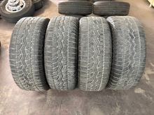 Load image into Gallery viewer, OEM '19-'26 RAM 1500 20" Used 2675 Wheels on 275/55R20 Falken Wildpeak Tires LT
