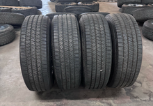 Load image into Gallery viewer, OEM '05-'26 RAM 2500 Steel Used Chrome Clad Wheels on 275/70R18 Firestone HT2 LT
