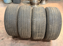Load image into Gallery viewer, Set of Used 20" '19-'26 RAM 1500 Black OEM Rims 275/55R20 Bridgestone Dueler LT
