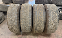 Load image into Gallery viewer, Set of 4 Used 18" '05-'26 Ford F-150 Black OEM Wheels 275/65R18 Goodyear AT LT
