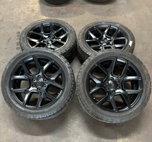 Load image into Gallery viewer, Set of 4 Used 22" Black '19-'26 RAM 1500 Wheels 285/45R22 Terrain Contact AT LT
