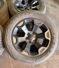 Load image into Gallery viewer, Set of Used '19-'26 RAM 1500 Black Clad Wheels on 275/55R20 Bridgestone Tires LT
