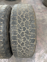 Load image into Gallery viewer, Set of Used '11-'26 GMC Sierra 2500 Denali Ultimate Rims 275/65R20 Goodyear E LT
