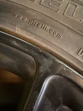 Load image into Gallery viewer, Set of 4 Used OEM 22" '19-'26 RAM 1500 Black Rims 285/45R22 Pirelli Scorpion LT
