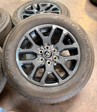 Load image into Gallery viewer, Set of Used 20" '22-'26 Toyota Tundra Dark Charcoal Wheels 265/60R20 Yokohama LT
