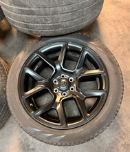 Load image into Gallery viewer, Set of 4 Used 22" '19-'26 RAM 1500 Matte Black Wheels 285/45R22 Pirelli Tires LT
