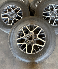 Load image into Gallery viewer, OEM '07-'26 Jeep Wrangler 18" Used Wheels on 255/70R18 Bridgestone HT Tires LT
