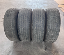 Load image into Gallery viewer, OEM '19-'26 RAM 1500 OEM Steel Used Wheels on 275/65R18 Goodyear H/T Tires LT
