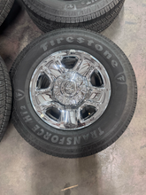 Load image into Gallery viewer, OEM '05-'26 RAM 2500 Steel Used Chrome Clad Wheels on 275/70R18 Firestone HT2 LT
