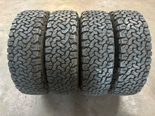 Load image into Gallery viewer, Set of 4 OEM '22-'26 INEOS Grenadier 18" Wheels on 255/70R18 BFGoodrich TAKO2 LT
