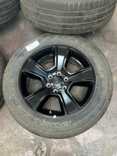 Load image into Gallery viewer, Set of 4 Used 20" Black '19-'26 RAM 1500 OEM Wheels 275/55R20 Bridgestone H/L LT
