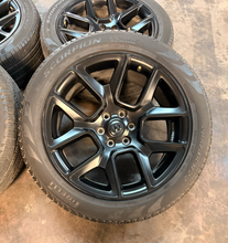 Load image into Gallery viewer, Set of 4 Used 22" '19-'26 RAM 1500 Matte Black Wheels 285/45R22 Pirelli Tires LT
