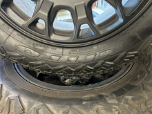 Load image into Gallery viewer, OEM '24-'26 Toyota Tacoma TRD Black Used Wheels 265/65R18 Nitto Nomad Grappler
