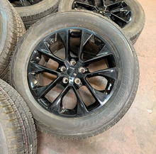 Load image into Gallery viewer, Set of 5 Used '07-'26 Jeep Wrangler Black 20" Wheels 275/55R20 Bridgestone HL LT
