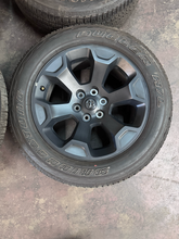 Load image into Gallery viewer, OEM '19-'26 RAM 1500 20" Matte Black Used Wheels on 275/55R20 Bridgestone HL LT
