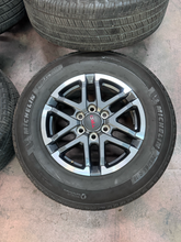 Load image into Gallery viewer, OEM '24-'26 Toyota Tacoma 18" TRD Used Wheels 265/65R18 Michelin Primacy LTX LT
