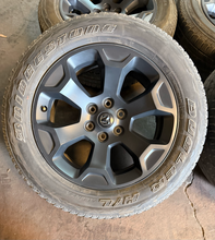 Load image into Gallery viewer, Set of Used '19-'26 RAM 1500 Black Clad Wheels on 275/55R20 Bridgestone Tires LT
