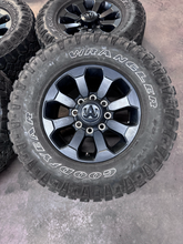 Load image into Gallery viewer, OEM '05-'26 RAM 2500 Power Wagon Used Black Rims 285/70R17 Goodyear Duratrac LT
