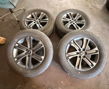 Load image into Gallery viewer, Set of Used '05-'26 Ford F150 Dark Grey Wheels 275/60R20 Hankook Dynapro AT2 LT
