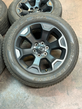 Load image into Gallery viewer, OEM '19-'26 RAM 1500 Matte Black 20" Used Wheels 275/55R20 Bridgestone Tires  LT
