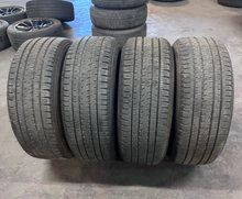 Load image into Gallery viewer, OEM '19-'26 RAM 1500 Matte Black 20" Used Wheels on 275/55R20 Bridgestone  LT
