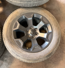 Load image into Gallery viewer, Set of Used '19-'26 RAM 1500 Black Clad Wheels on 275/55R20 Bridgestone Tires LT
