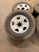 Load image into Gallery viewer, Set of 4 Used 18" '05-'26 Dodge RAM 2500 Steel Wheels 275/70R18 Firestone HT LT
