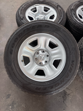 Load image into Gallery viewer, OEM '19-'26 RAM 1500 OEM Steel Used Wheels on 275/65R18 Goodyear H/T Tires LT

