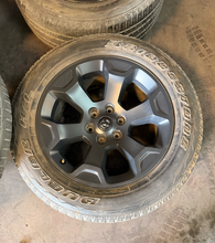 Load image into Gallery viewer, Set of Used '19-'26 RAM 1500 Black Clad Wheels on 275/55R20 Bridgestone Tires LT

