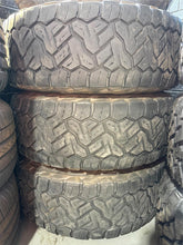 Load image into Gallery viewer, Set of 4 Used &#39;05-&#39;25 Ford F150 3997 Wheels on 295/70R18 Nitto Recon Grappler AT
