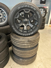 Load image into Gallery viewer, Set of Four OEM Black '19-'26 RAM 1500 Wheels 275/55R20 Bridgestone Alenza Tires
