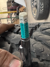 Load image into Gallery viewer, OEM '05-'26 RAM 2500 Power Wagon Used Black Rims 285/70R17 Goodyear Duratrac LT
