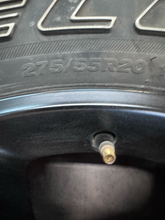 Load image into Gallery viewer, OEM '19-'26 RAM 1500 OEM Black Used Wheels on 275/55R20 Bridgestone HL Tires LT
