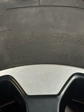 Load image into Gallery viewer, Set of 4 Used OEM '05-'26 RAM 2500 Power Wagon Wheels on 285/70R17 BFGoodrich AT
