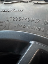 Load image into Gallery viewer, OEM '07-'26 Jeep Wrangler 17" Black Used Rims 285/70R17 BFGoodrich AT Tires LT

