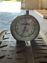 Load image into Gallery viewer, OEM '19-'26 RAM 1500 Charcoal Machined Used Rims 275/55R20 Bridgestone Tires LT
